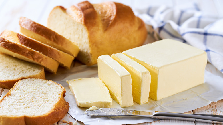 Sliced white bread with butter