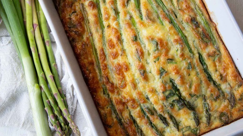 Asparagus egg bake in white dish