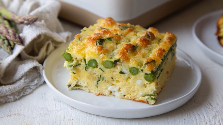 Spring veggie egg bake slice on plate