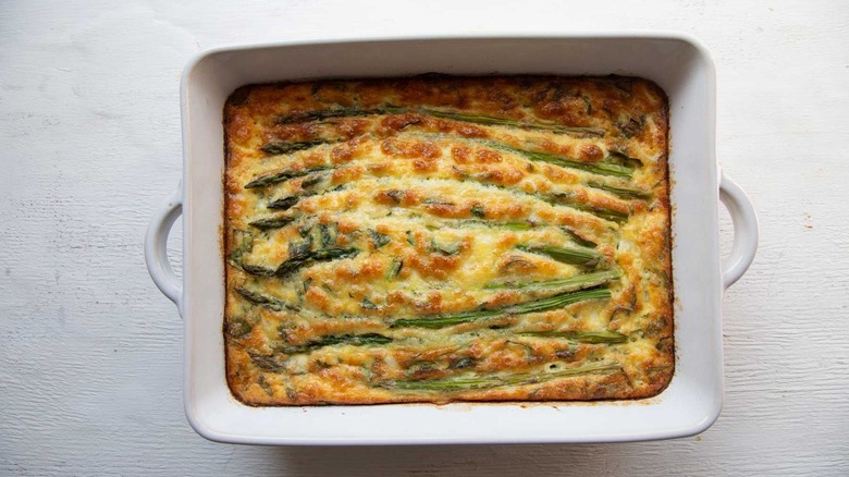 Asparagus egg bake in white dish
