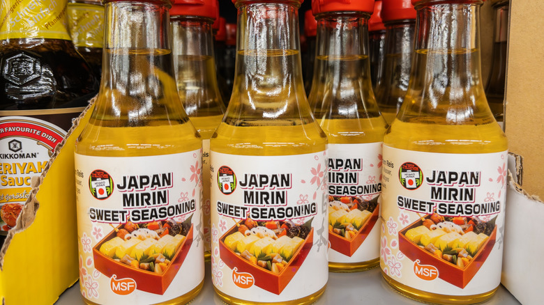 Bottles of Japanese Mirin seasoning on shelf