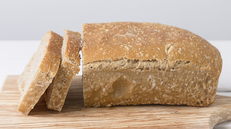 Close-up of a sliced loaf of white sandwich bread