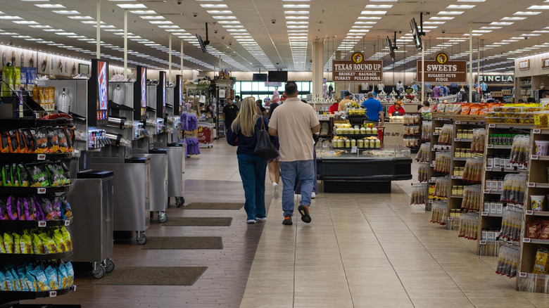 Shoppers walk through a Buc-ee's store