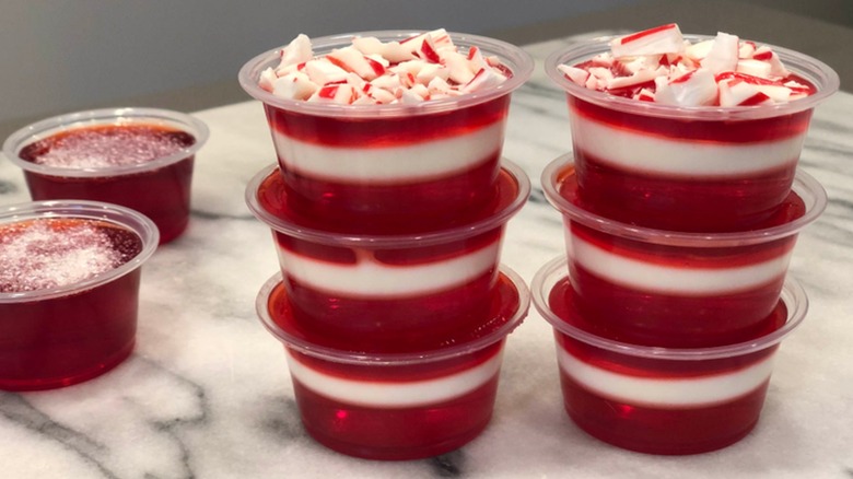 A stack of homemade red and white Jell-O shots for a party