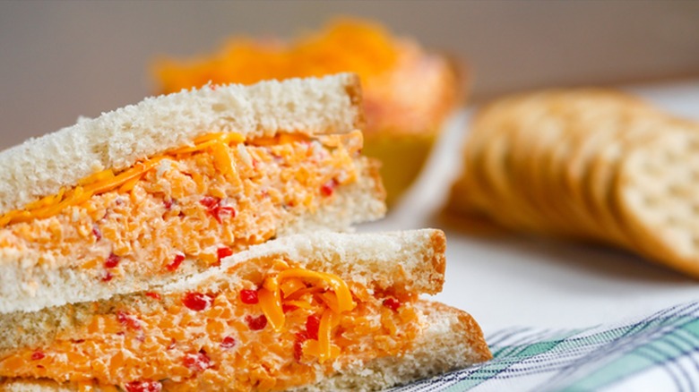 Close-up of a pimento cheese sandwich and crackers
