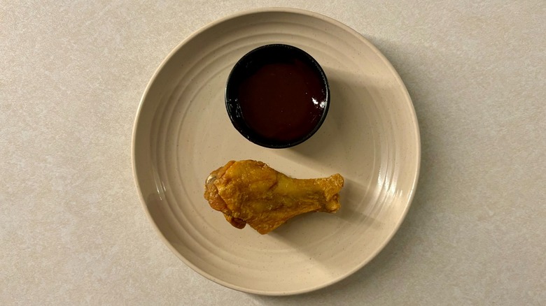 Buffalo Wild Wings Honey BBQ sauce and wing on plate