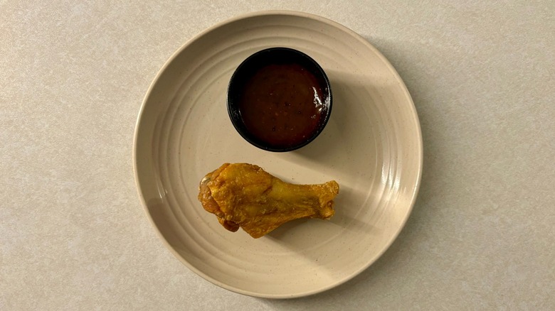 Buffalo Wild Wings Caribbean Jerk sauce and wing on plate