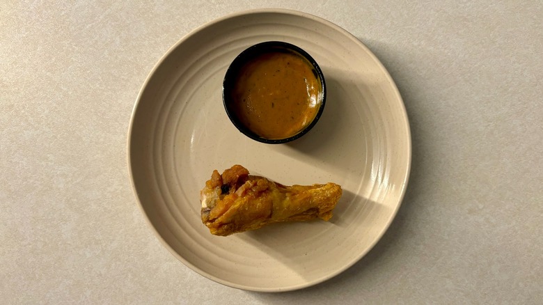 Buffalo Wild Wing Thai Curry sauce and wing on plate