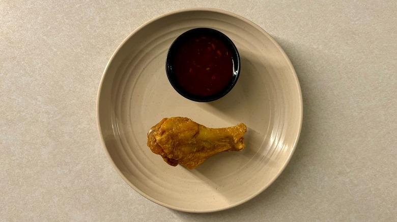 Buffalo Wild Wings Asian Zing sauce and wing on plate