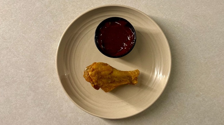 Buffalo Wild Wings Blazin' Knockout sauce and wing on plate