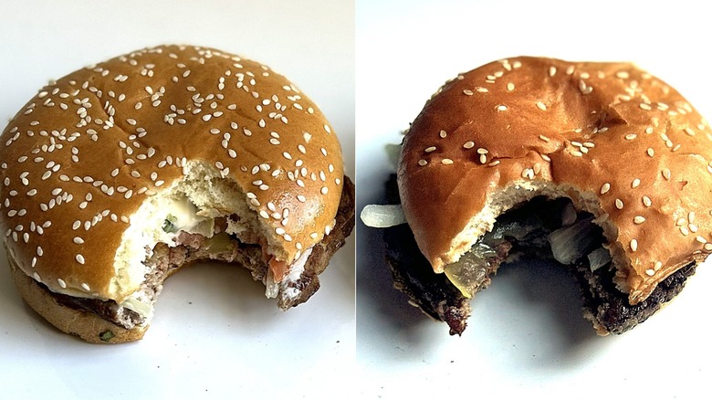 The McDonald's Double Quarter Pounder side by side with the Burger King Whopper on a table, with bites taken out of it.
