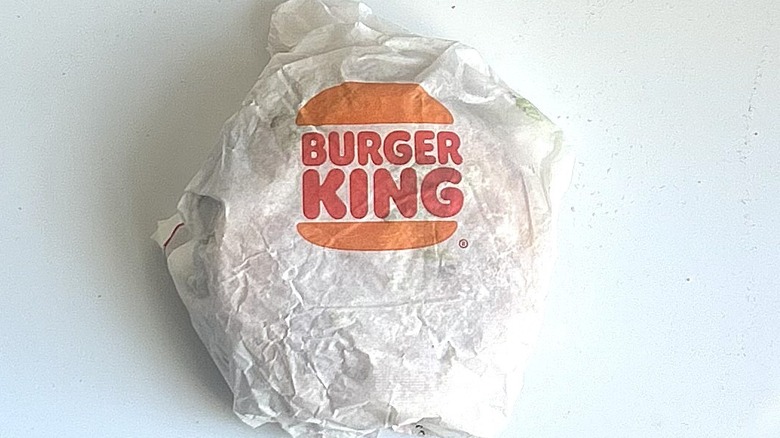 The Whopper from Burger King in its wrapper, isolated.