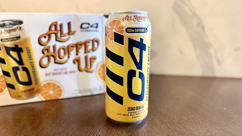 Can of C4 All Hopped Up on a table with C4 product box in background