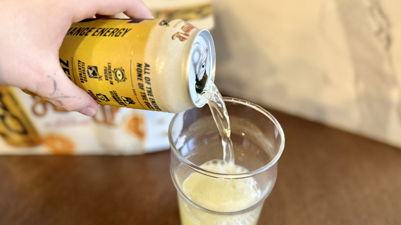 Pouring can of C4 All Hopped Up into a glass