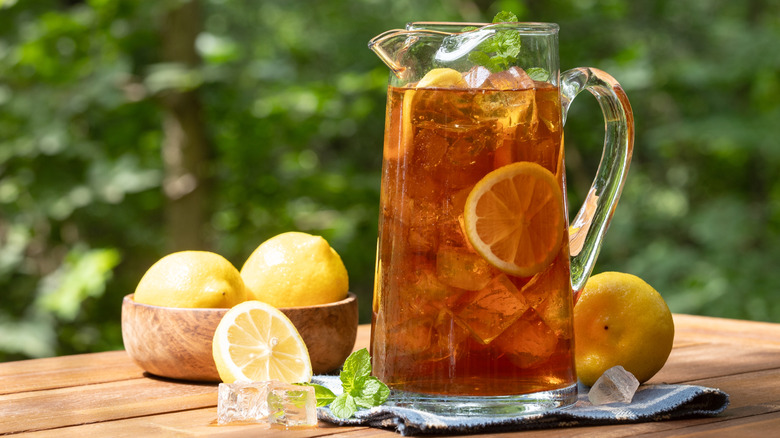 Pitcher of iced tea with lemon