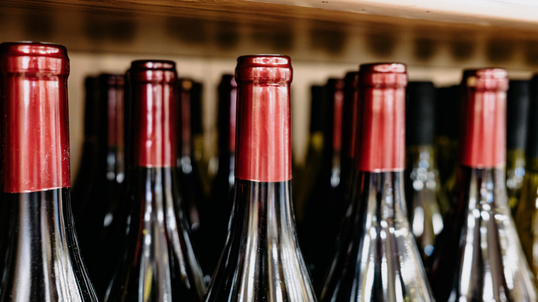 Closeup of wine bottles on shelf