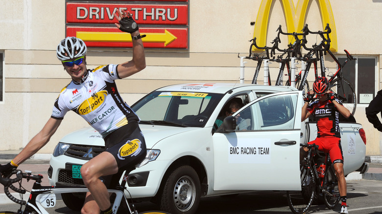 Cyclists ride through McDonald's drive-thru