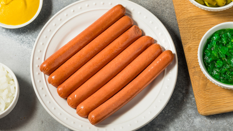 A plate of uncured hot dogs