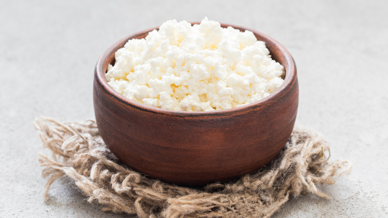 brown bowl of fresh cottage cheese