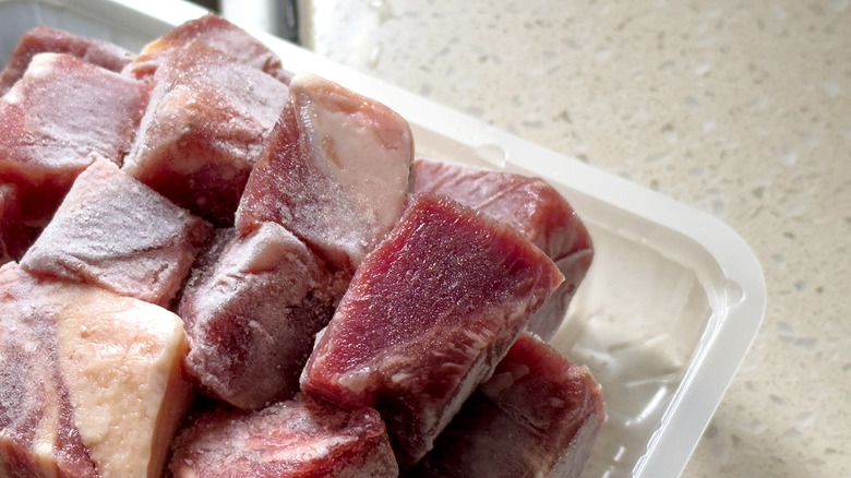 Beef thawing at room temperature
