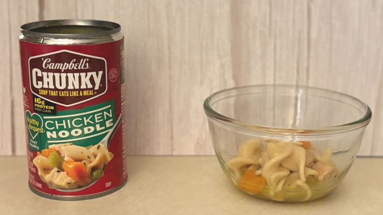 Campbell's Healthy Request Chunky Canned Chicken Noodle Soup can and soup in bowl