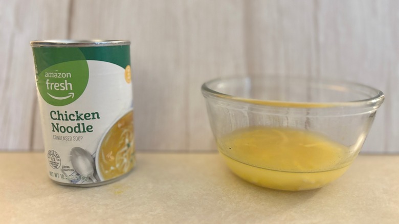 Amazon Fresh Canned Chicken Noodle Soup can and soup in bowl