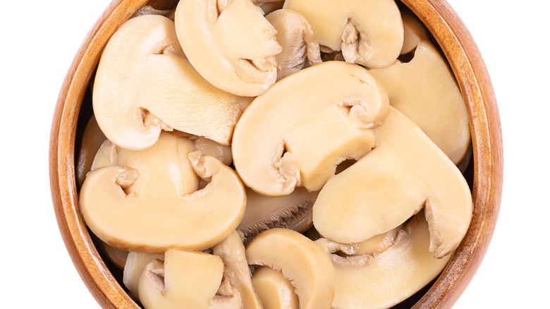 Canned sliced mushrooms in a bowl
