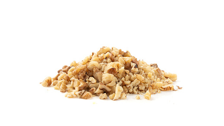 Isolated crushed nuts on a white background