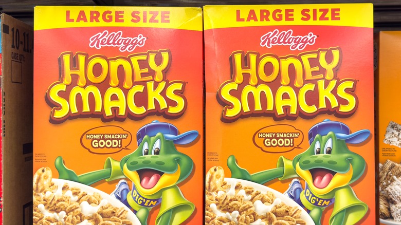 Several boxes of Kellogg's Honey Smacks cereal on display