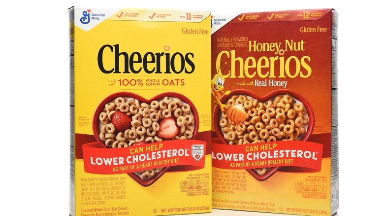 Boxes of Cheerios and Honey Nut Cheerios on the shelf at a store