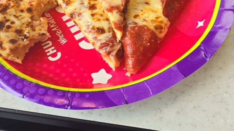 pizza slices on paper plate