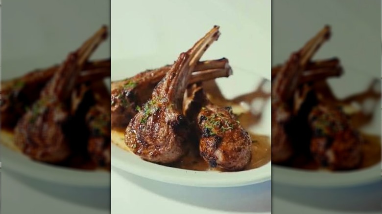 lamb chops on a plate at Ruth's Chris