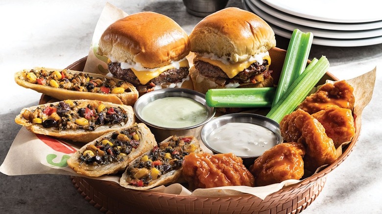 Chili's Triple Dipper with boneless buffalo wings, Southwestern Egg Rolls, and Big Mouth Bites