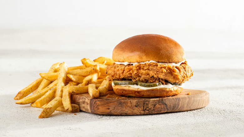 The Big Crispy Chicken Sandwich from Chili's with french fries beside it