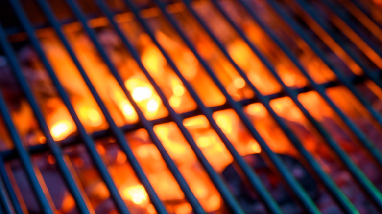 Grill grates preheating over fire