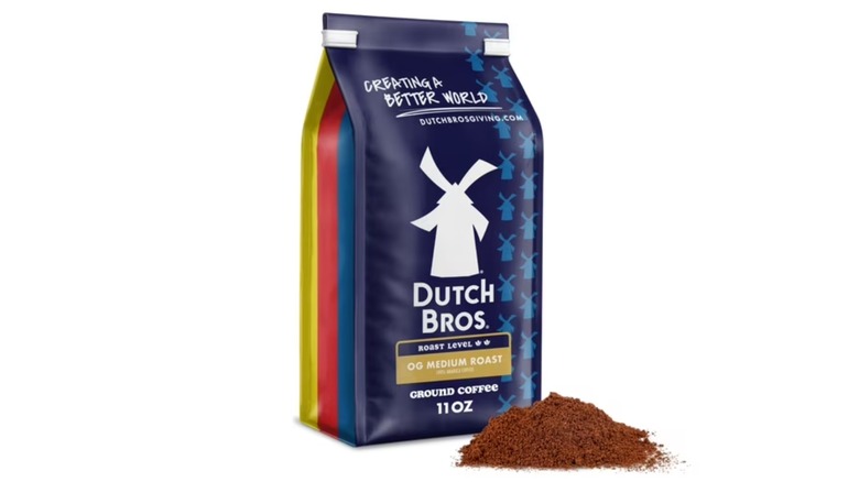 Bag of Dutch Bros Medium Roast and coffee grounds