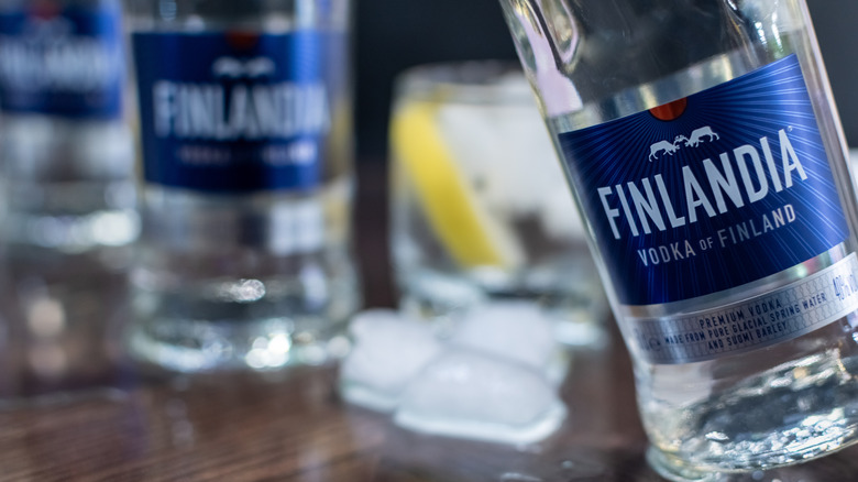 Bottles of Finlandia Vodka with glasses and ice