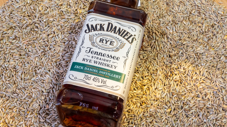 Jack Daniel's Tennessee Straight Rye bottle on rye grains