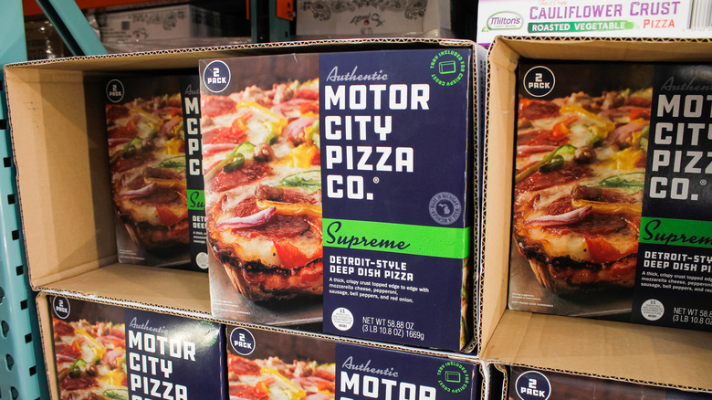Motor City Pizza Co. box on display in freezer section at warehouse club.