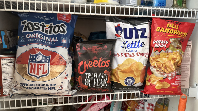 A shelf of various chips