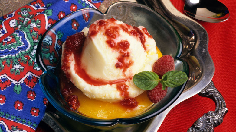 Bowl of peach melba on a silver tray