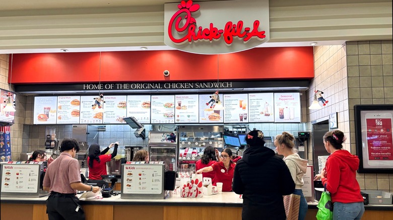 People ordering inside Chick-fil-A location