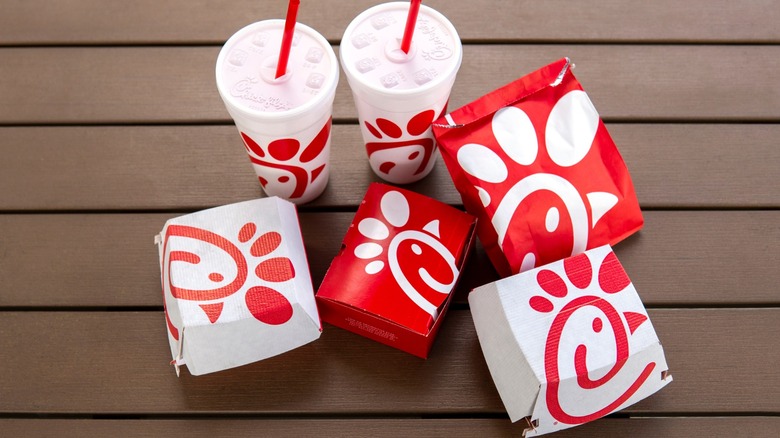 Chick-fil-A food and drink containers on wood table