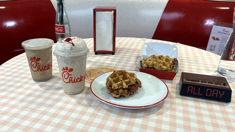 The new lineup of Chick-fil-A seasonal items is displayed on a table