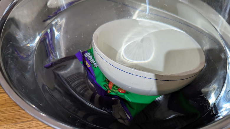 taki bag under water with bowl on top