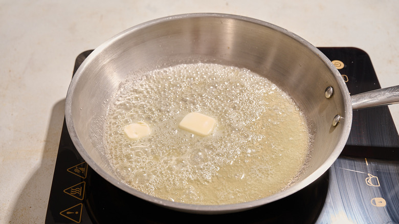 melting butter in a skillet