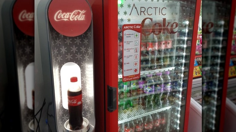 An Arctic Coke vending machine selling frozen Coca-Cola bottles.