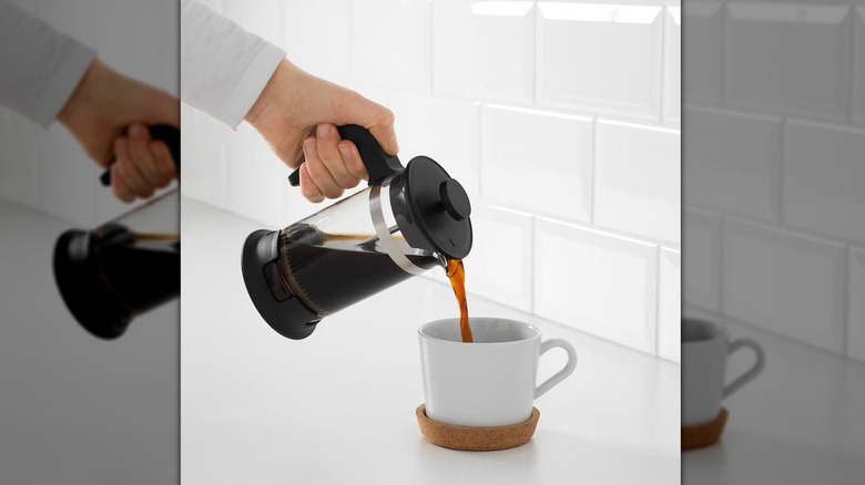 IKEA french press pouring coffee into cup