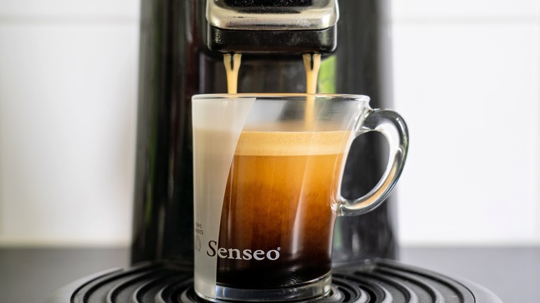 Coffee pouring into Senseo cup