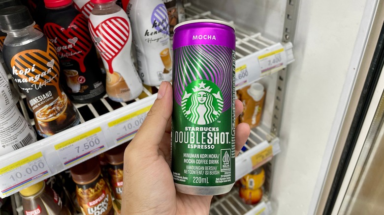 Hand holding Starbucks Doubleshot drink